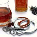 Handcuffs, alcohol and keys