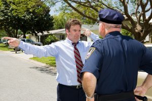 police officer conducts a field sobriety test