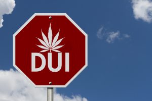 dui stop sign with marijuana leaf