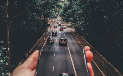 A road coming out of a phone. Find out how you can get your DUI charges reduced in California with a lawyer.