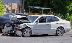 smashed-up white car