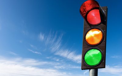 traffic light against a blue sky