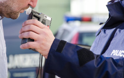 man taking breathalyzer