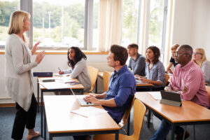 Teacher and students in a classroom How much are DUI classes in California