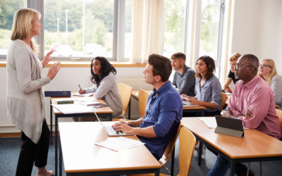 teacher teaching adult class