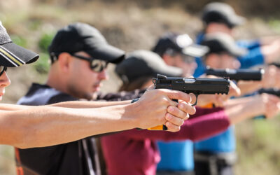 young people learning how to use a firearm