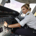 female pilot at the controls