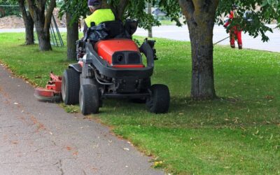 A person considers hiring a lawyer after getting a DUI on a lawn mower.