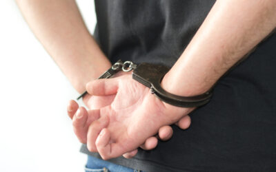 A man in handcuffs wonders, “can a case be reopened if it was dismissed without prejudice?” 