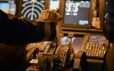 A pilot in a cockpit. You can ask a lawyer if you can fly with a suspended license.