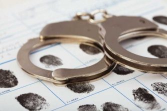 An arrest and evidence obtained at the station can be claimed to be illegal through a motion to suppress. A denial of the order means the court disagrees.