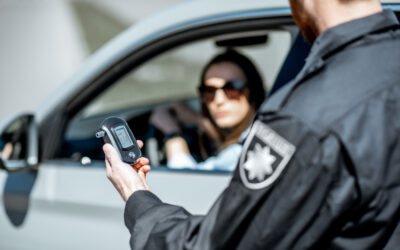 Police officer stands near woman’s car and informs her that her blood alcohol registered above a .08