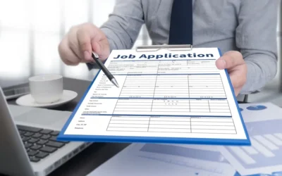 A man holding a job application. A lawyer can explain if you should disclose your DUI on a job application.