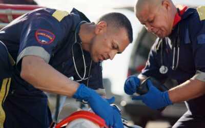 A paramedic helping an injured car accident victim. Can you be a paramedic with a DUI?
