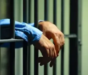 A person in jail. A lawyer can explain how long you go to jail for drunk driving in California. 