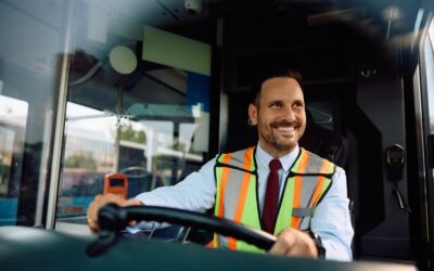 a bus driver smiling. Can you be a bus driver with a DUI?