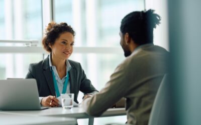 Lawyer discussing with their client whether someone can work at a bank with a DUI