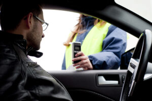 Man takes breathalyzer that shows he is over California’s legal limit.
