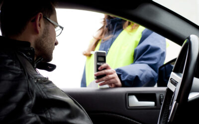 Man takes breathalyzer that shows he is over California’s legal limit.
