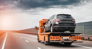 A car getting towed. Learn about Santa Ana DUI impound lots.