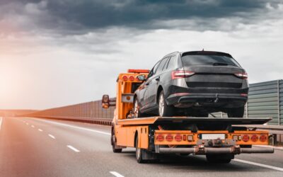 A car getting towed. Learn about Santa Ana DUI impound lots.