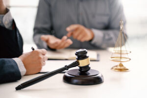 Lawyer meets with client to explain what happens if you leave the scene after a DUI accident.